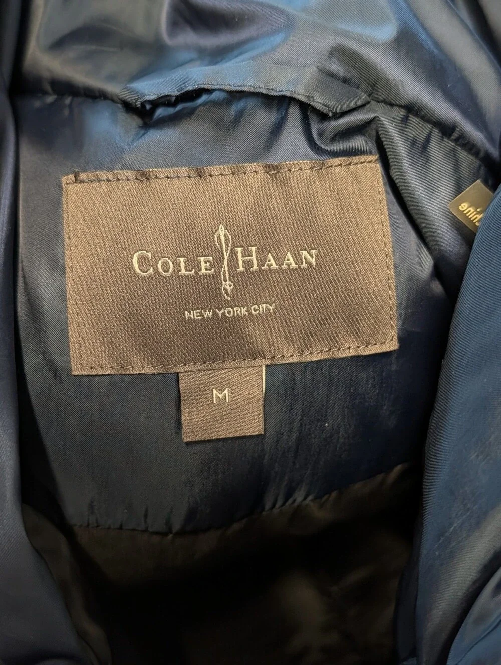 Cole Haan long snap feathers